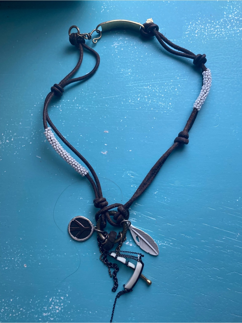 Lucky Brand Brown Suede Cord Necklace with White Bead Wraps and Mixed Charms